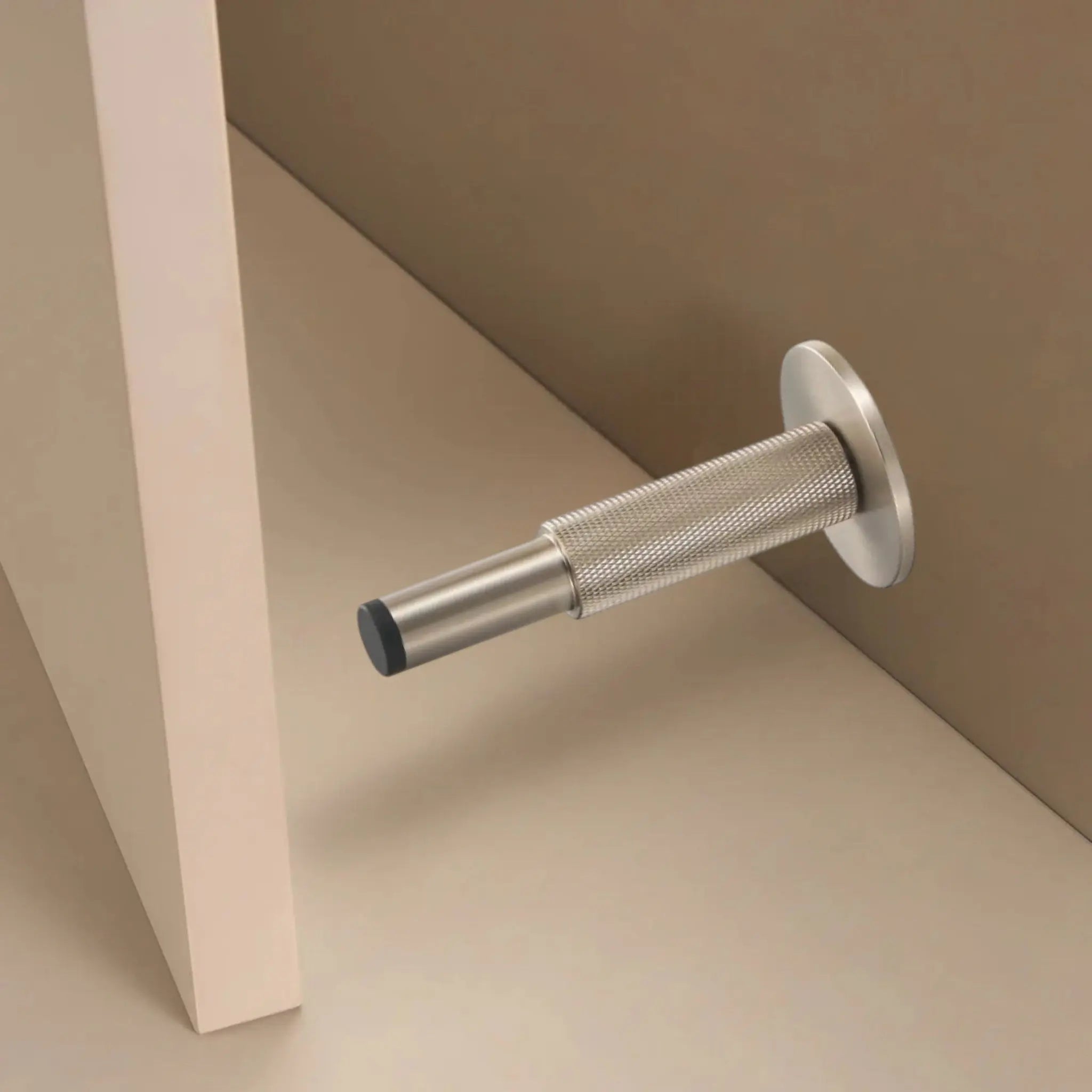 Butée de porte mural en laiton moleté - Ravel Afinaure