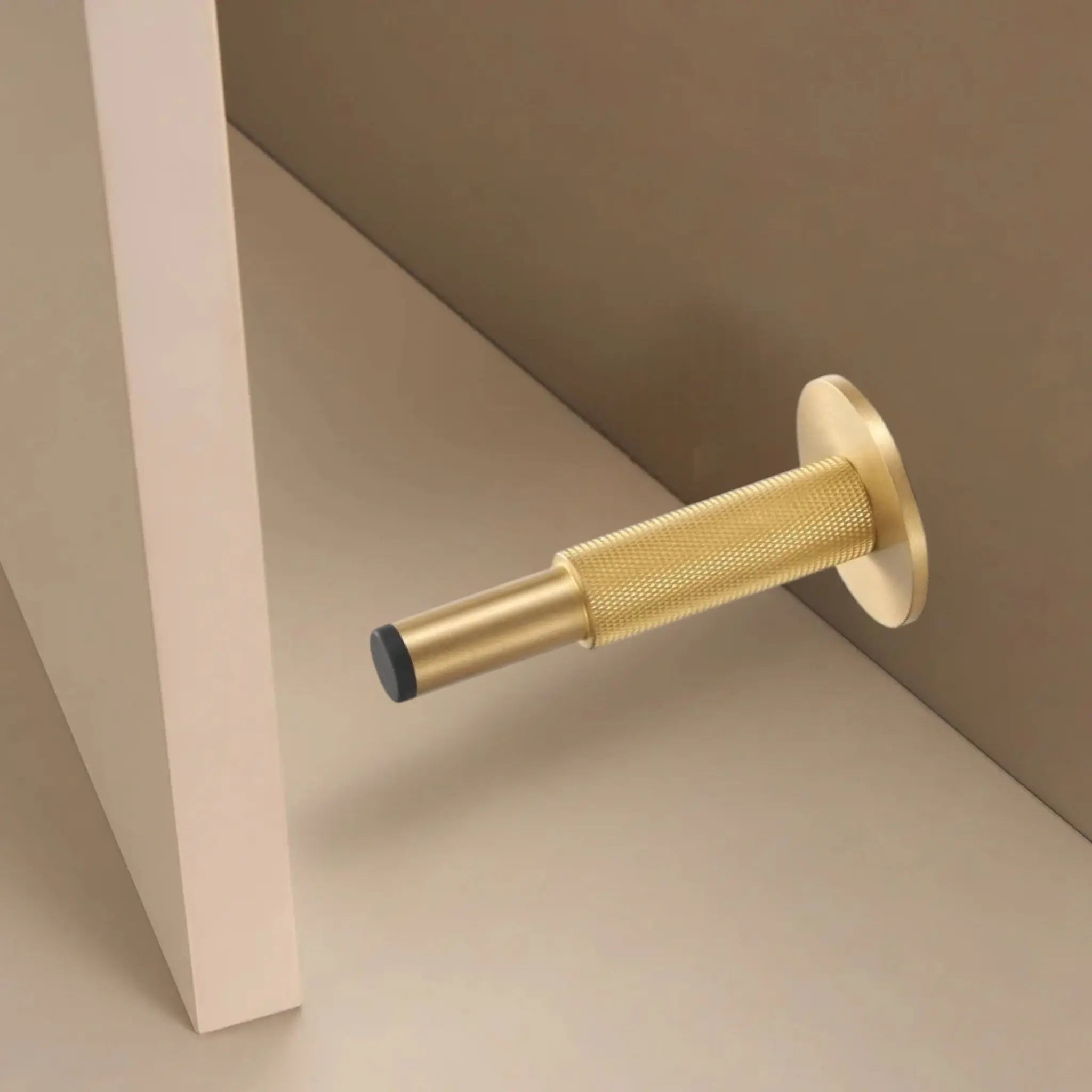 Butée de porte mural en laiton moleté - Ravel Afinaure